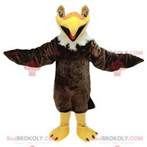 Brown and white golden eagle mascot. Eagle costume -