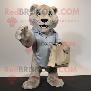 Silver Smilodon mascot costume character dressed with a Poplin Shirt and Clutch bags