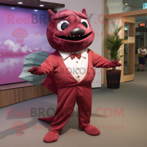 Maroon Tuna mascot costume character dressed with a Jumpsuit and Bow ties