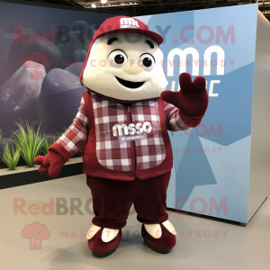 Maroon Ice mascot costume character dressed with a Flannel Shirt and Shawls