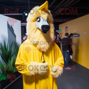 Yellow Llama mascot costume character dressed with a Hoodie and Lapel pins