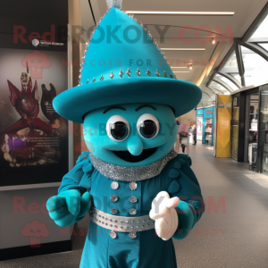 Turquoise Queen mascot costume character dressed with a Oxford Shirt and Hat pins
