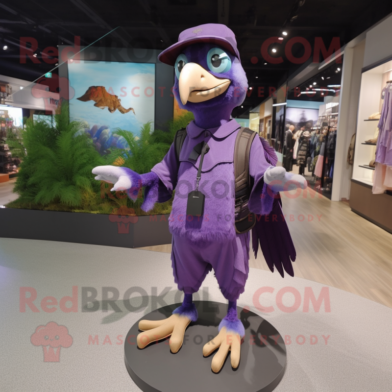Purple Archeopteryx mascot costume character dressed with a Long Sleeve Tee and Caps