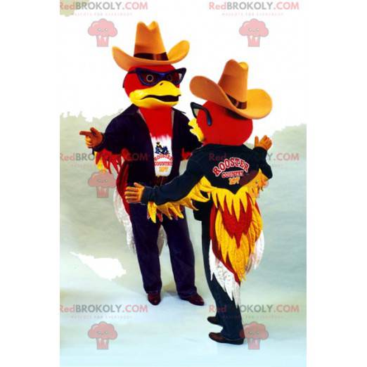 Mascota de pareja de águila roja en traje de vaquero -