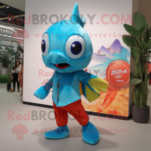 Turquoise Goldfish mascot costume character dressed with a Flare Jeans and Clutch bags