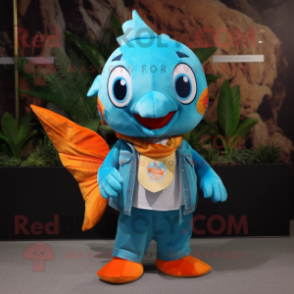 Turquoise Goldfish mascot costume character dressed with a Flare Jeans and Clutch bags