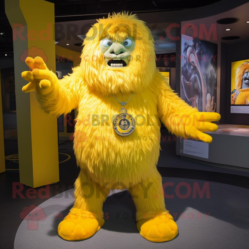 Yellow Yeti mascot costume character dressed with a Long Sleeve Tee and Brooches Yellow Yeti mascot costume character dressed with a Long Sleeve Tee and Brooches