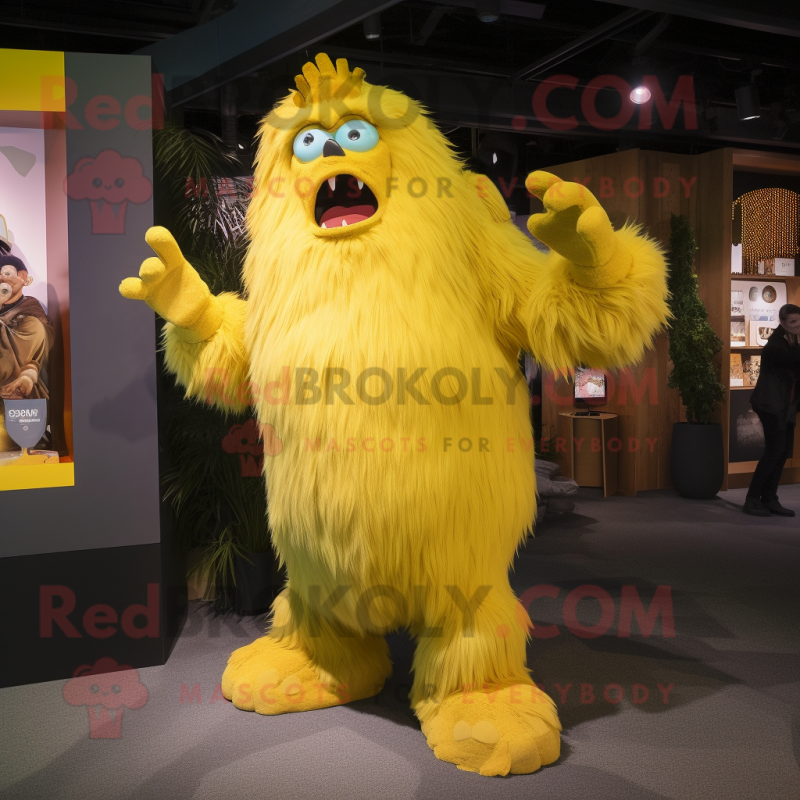 Yellow Yeti mascot costume character dressed with a Long Sleeve Tee and Brooches Yellow Yeti mascot costume character dressed with a Long Sleeve Tee and Brooches