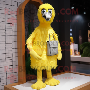 Lemon Yellow Ostrich mascot costume character dressed with a Overalls and Shawls