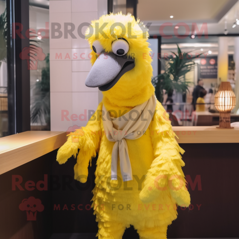 Lemon Yellow Ostrich mascot costume character dressed with a Overalls and Shawls