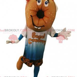 Mascotte de bagel avec un t-shirt et un short. Costume de bagel