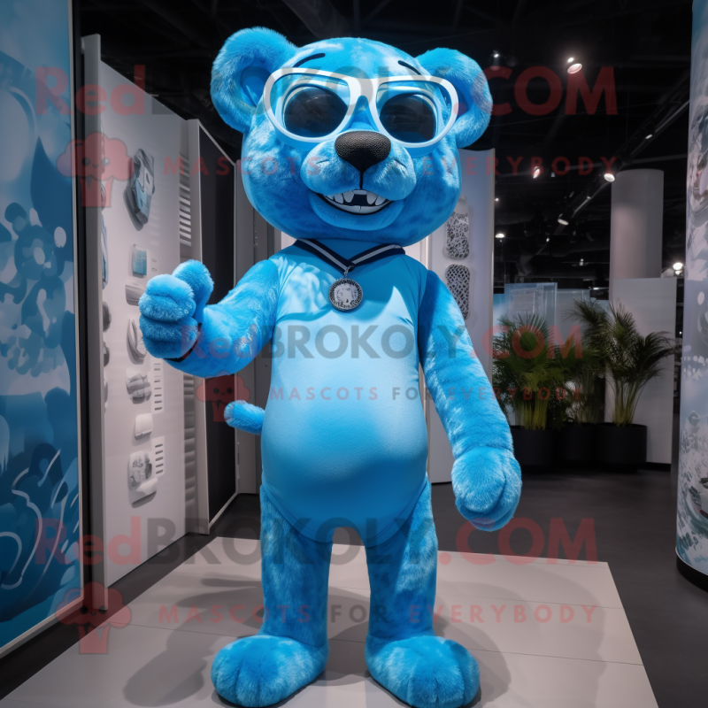 Sky Blue Panther mascot costume character dressed with a Playsuit and Eyeglasses Sky Blue Panther mascot costume character dressed with a Playsuit and Eyeglasses