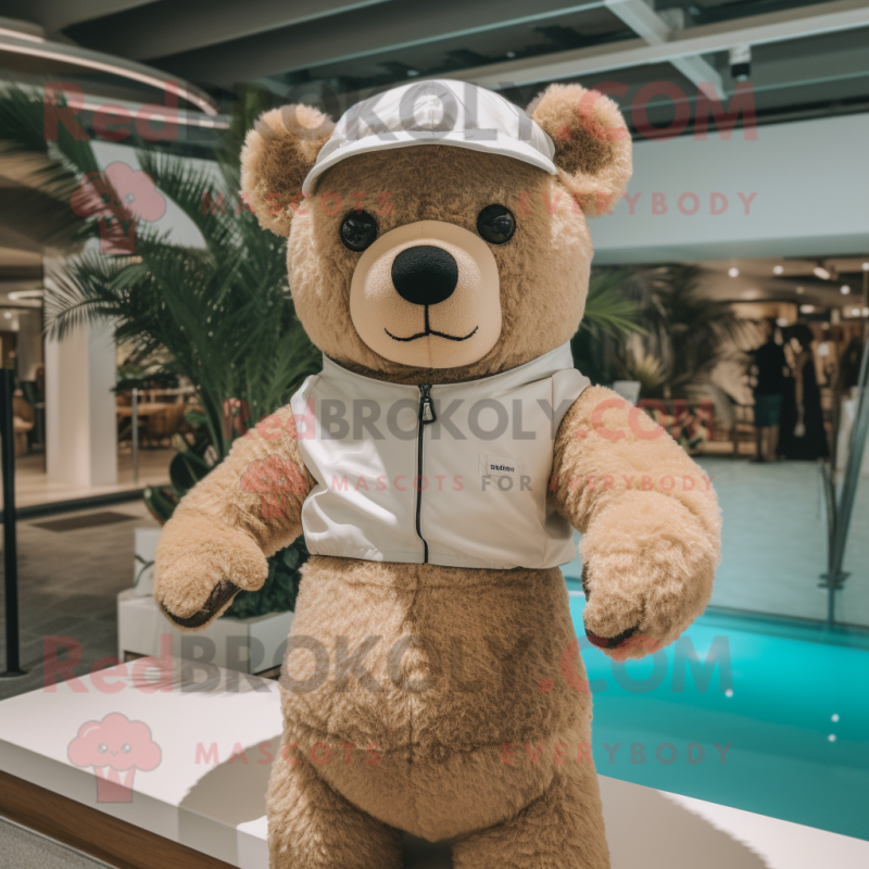 Beige Teddy Bear mascot costume character dressed with a Swimwear and Mittens Beige Teddy Bear mascot costume character dressed with a Swimwear and Mittens