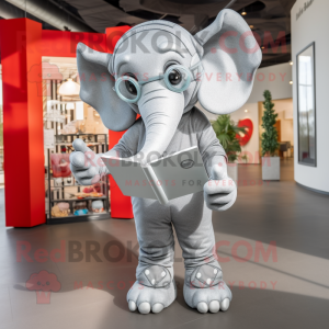 Silver Elephant mascot costume character dressed with a Romper and Reading glasses