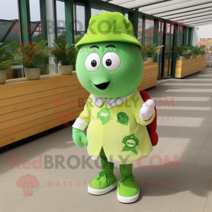Green Tomato mascot costume character dressed with a T-Shirt and Berets