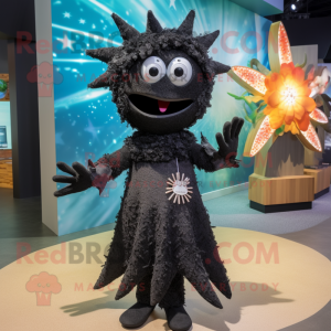 Black Starfish mascot costume character dressed with a Maxi Dress and Brooches