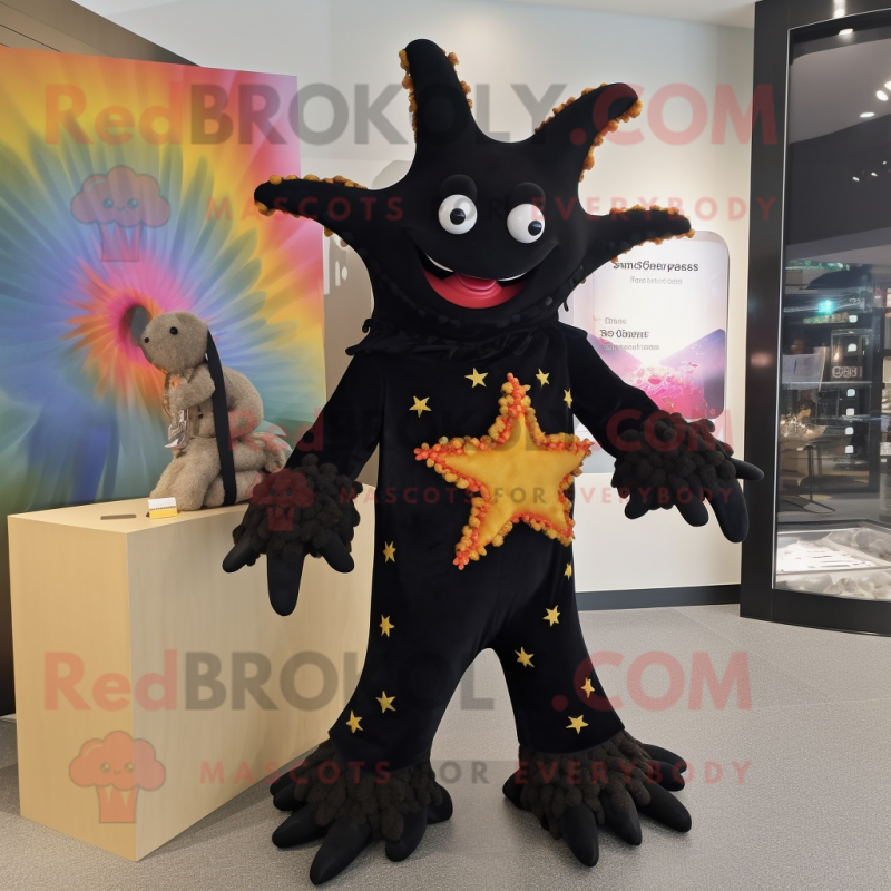 Black Starfish mascot costume character dressed with a Maxi Dress and Brooches