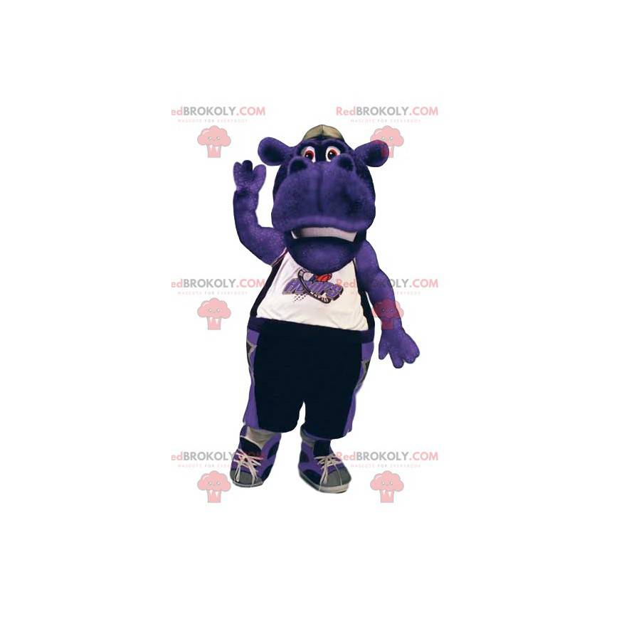 Maskot fialový hyppopotamus ve sportovním oblečení. - Maskot fialový hyppopotamus ve sportovním oblečení. -