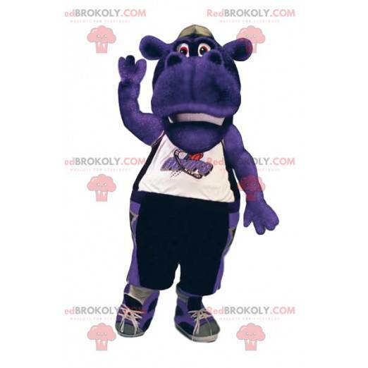 Maskotka fioletowy hipopotam w odzieży sportowej. -