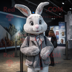 Silver Rabbit mascot costume character dressed with a Jacket and Scarves