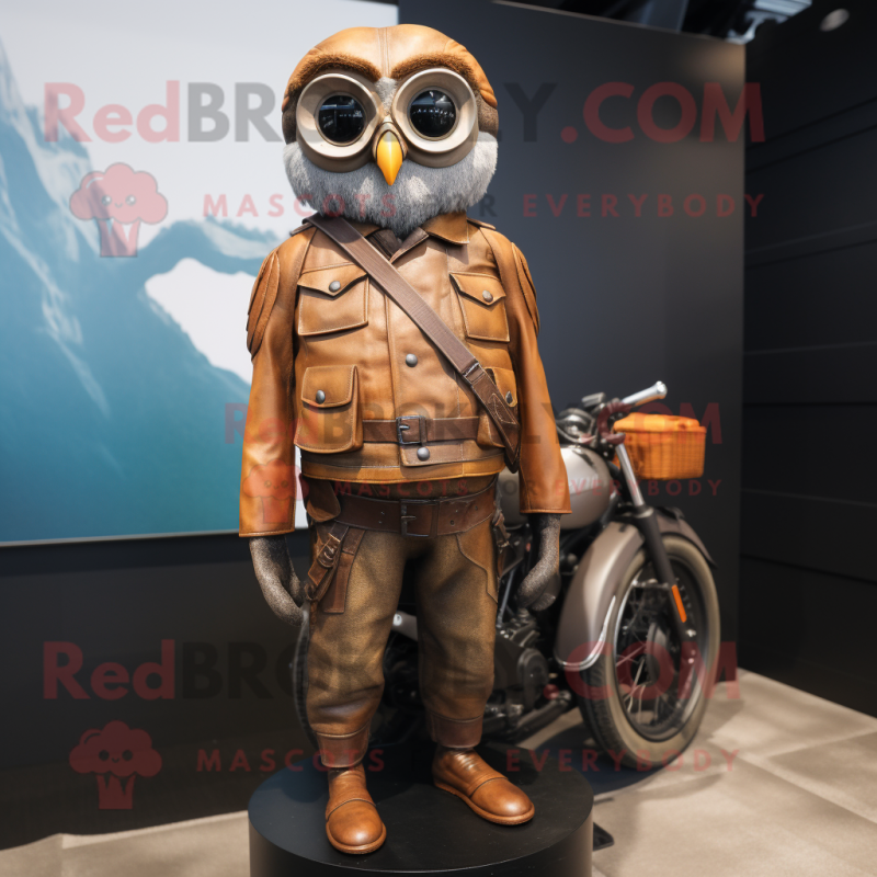 Rust Owl mascot costume character dressed with a Moto Jacket and Briefcases