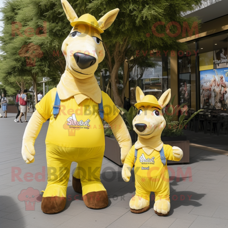 Yellow Donkey mascot costume character dressed with a Mom Jeans and Messenger bags Yellow Donkey mascot costume character dressed with a Mom Jeans and Messenger bags