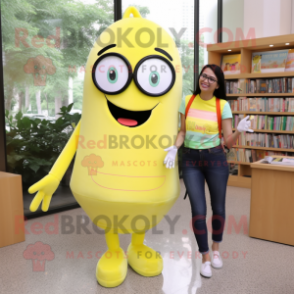 Lemon Yellow Rainbow mascot costume character dressed with a Mom Jeans and Reading glasses