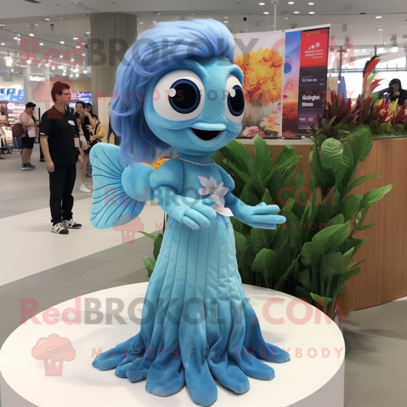 Sky Blue Betta Fish mascot costume character dressed with a Mini Dress and Hair clips Sky Blue Betta Fish mascot costume character dressed with a Mini Dress and Hair clips