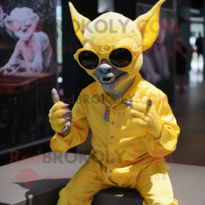 Yellow Gargoyle mascot costume character dressed with a Romper and Sunglasses