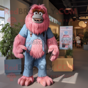 Pink Sasquatch mascot costume character dressed with a Chambray Shirt and Mittens