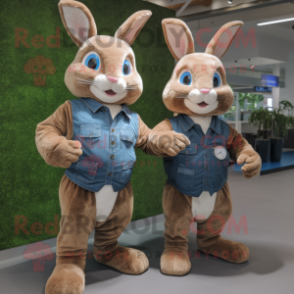 Brown Wild Rabbit mascot costume character dressed with a Boyfriend Jeans and Smartwatches