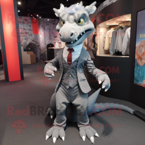 Gray Dragon mascot costume character dressed with a Suit Jacket and Shoe clips