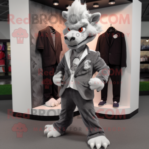 Gray Dragon mascot costume character dressed with a Suit Jacket and Shoe clips
