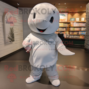 Gray Beluga Whale mascot costume character dressed with a Henley Tee and Headbands