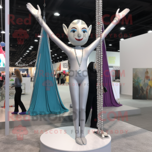 Silver Trapeze Artist mascot costume character dressed with a Yoga Pants and Earrings