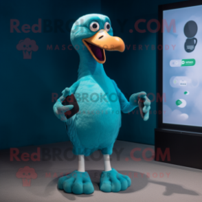 Cyan Dodo Bird mascot costume character dressed with a Graphic Tee and Smartwatches