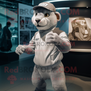 Silver Puma mascot costume character dressed with a Shorts and Caps