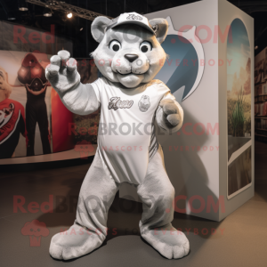 Silver Puma mascot costume character dressed with a Shorts and Caps