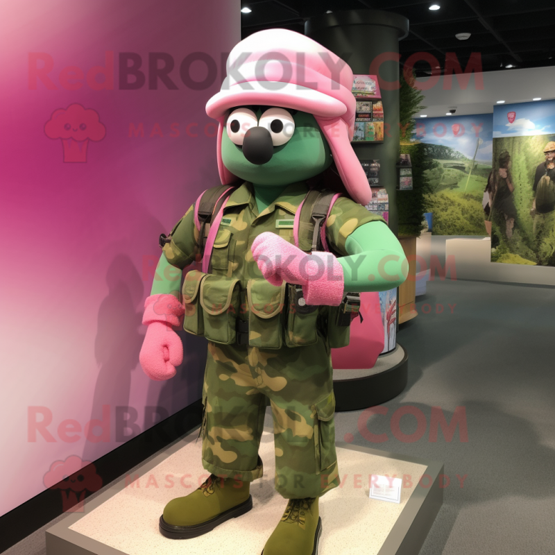Pink Green Beret mascot costume character dressed with a Tank Top and Backpacks Pink Green Beret mascot costume character dressed with a Tank Top and Backpacks