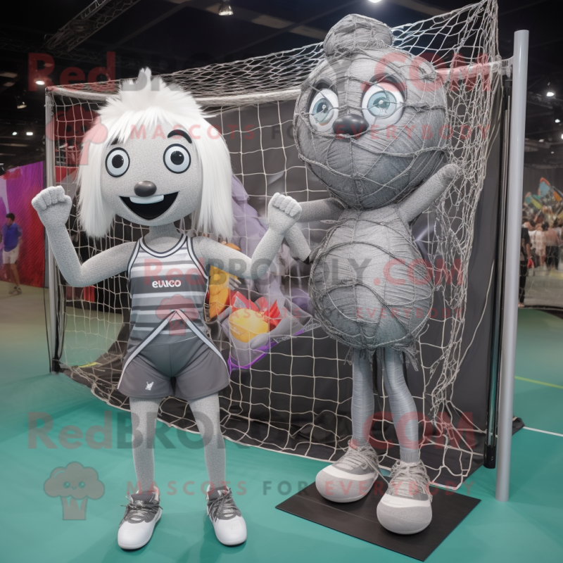 Silver Volleyball Net mascot costume character dressed with a Mini Dress and Briefcases Silver Volleyball Net mascot costume character dressed with a Mini Dress and Briefcases