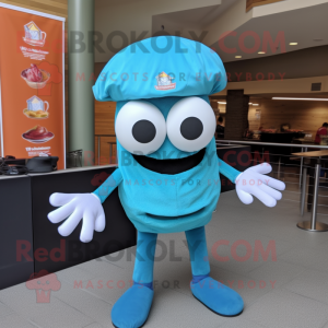 Cyan Crab Cakes mascot costume character dressed with a Graphic Tee and Hat pins