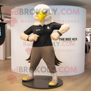 Tan Bald Eagle mascot costume character dressed with a Yoga Pants and Bracelet watches