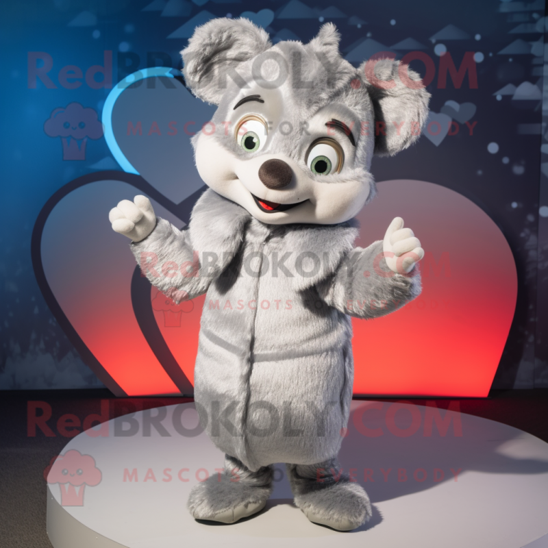 Silver Heart mascot costume character dressed with a Coat and Mittens Silver Heart mascot costume character dressed with a Coat and Mittens