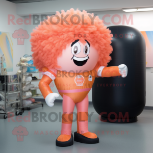 Peach Human Cannon Ball mascot costume character dressed with a Rash Guard and Hair clips