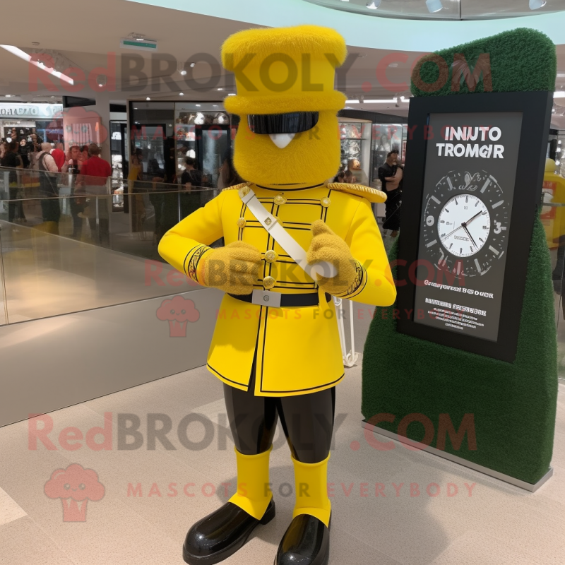 Yellow British Royal Guard mascot costume character dressed with a Bermuda Shorts and Digital watches