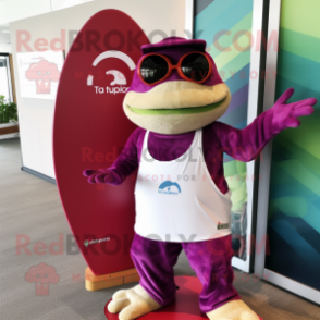 Magenta Frog mascot costume character dressed with a Board Shorts and Reading glasses