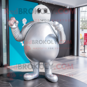 Silver Boxing Glove mascot costume character dressed with a One-Piece Swimsuit and Shawls