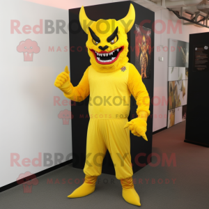Yellow Devil mascot costume character dressed with a Suit Pants and Foot pads