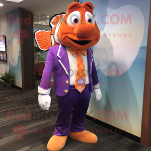 Purple Clown Fish mascot costume character dressed with a Poplin Shirt and Tie pins
