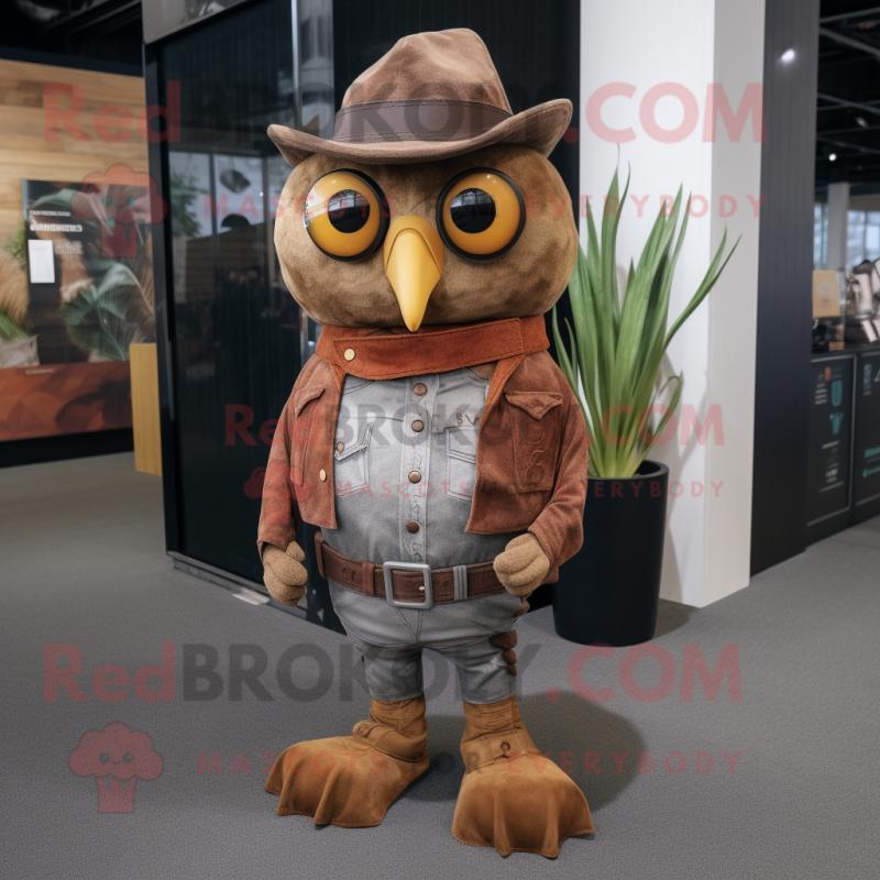 Rust Owl mascot costume character dressed with a Bootcut Jeans and Cummerbunds Rust Owl mascot costume character dressed with a Bootcut Jeans and Cummerbunds